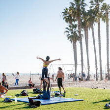 Acrobats practice at Muscle Beach in Santa Monica, California